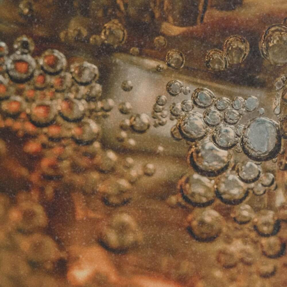 Close up of fermented cola bubbles