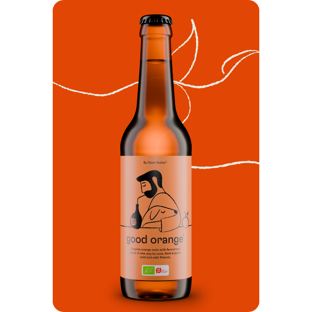 A bottle of good orange, which is an organic, fermented and reduced sugar soda on an orange background.